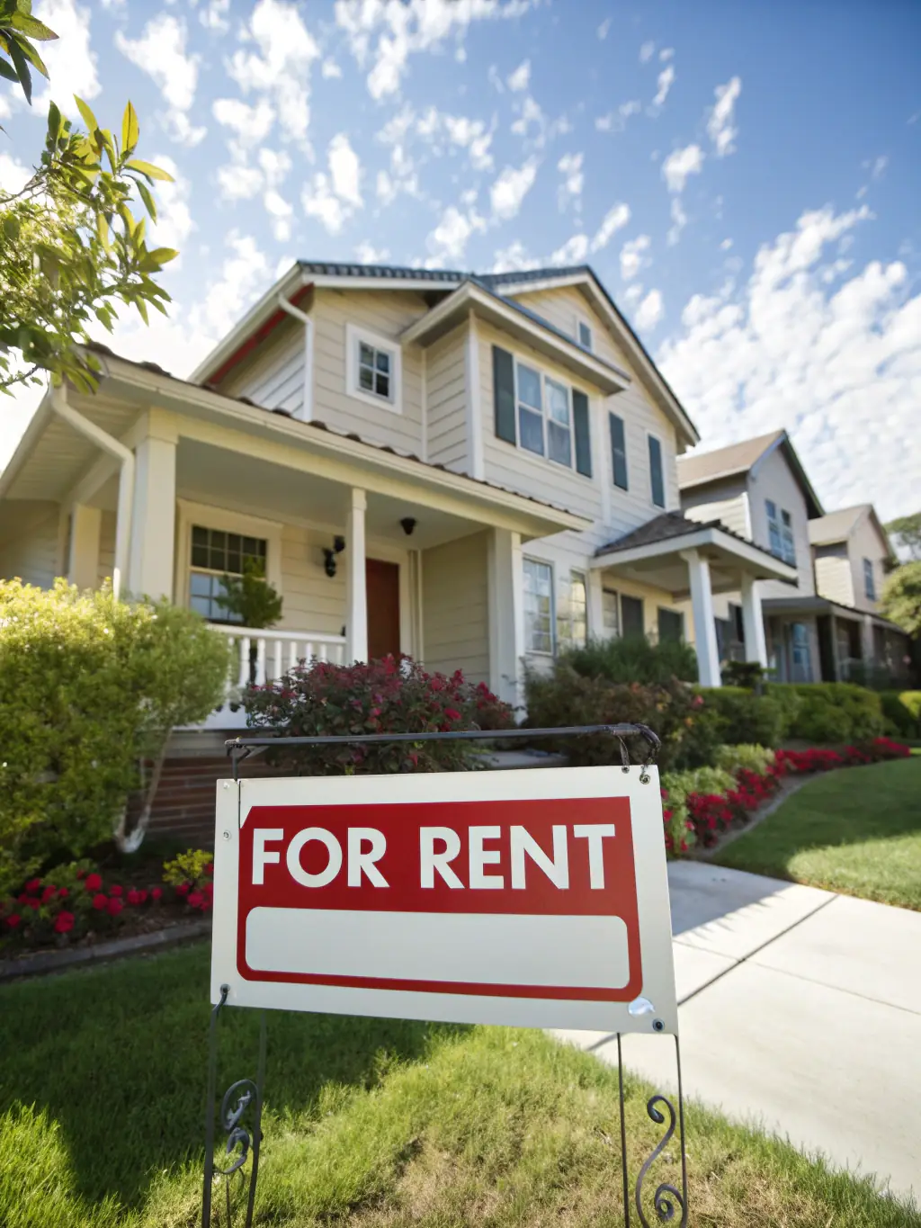 A cozy, well-maintained single-family home with a 'For Rent' sign in the yard, highlighting the appeal of rental properties and the stability of rental income.